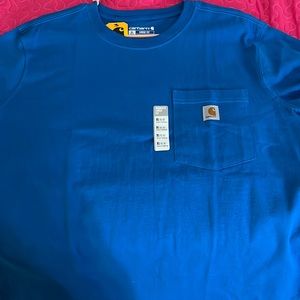 I am selling a brand new never been worn Carhart shirt. It is a loose fit.